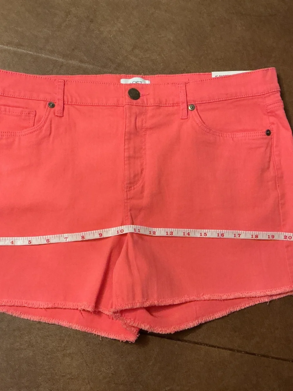 Loft 4” women”s shorts mid rise 98% cotton, 2% spandex. Size 10, coral color.